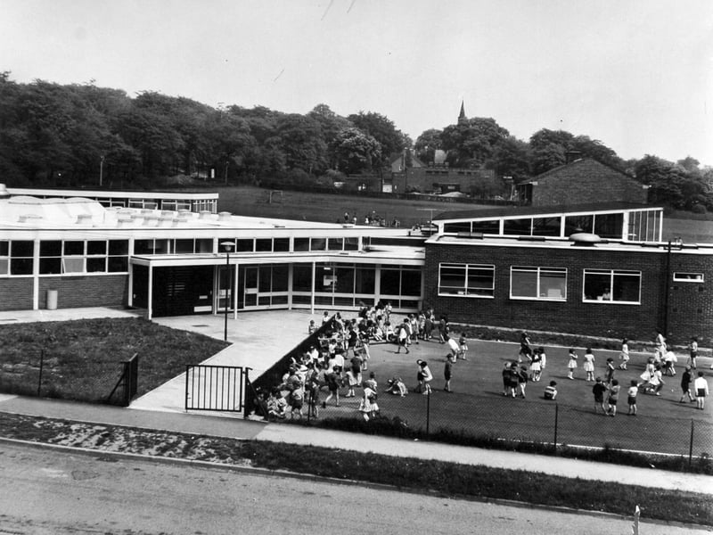 Children in the playground at Fir Tree C. P. Infants' School, Moortown, Leeds, in May 1968