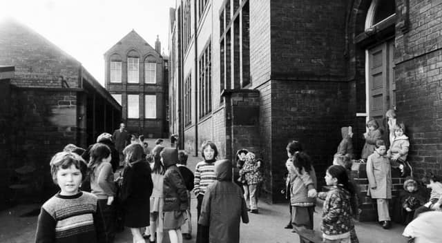Children in the playground at Castleton Primary School, Armley, Leeds, in March 1977