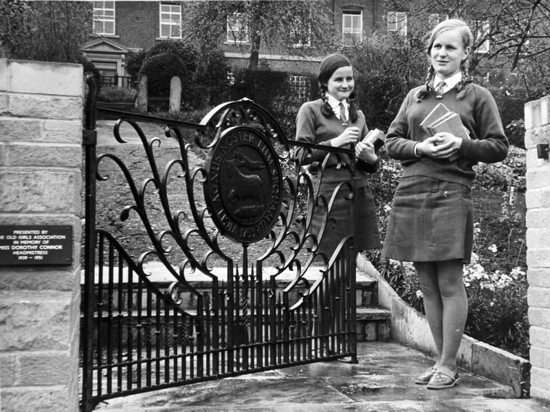 Pupils Christine Rutley (left) and Diane Gregson, both of Bradford, at the memorial gate to Miss Dorothy Connor in the gardens of Fulneck Girls' School, Pudsey, in April 1971