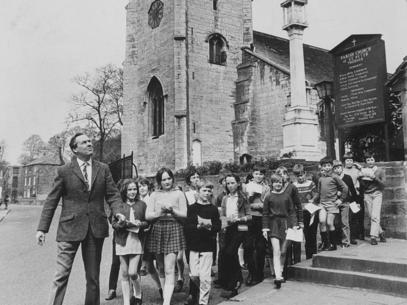 T. W. Brown, headteacher of Thorner C of E Primary School, in Wetherby, leads pupils on a church tower walk in May 1972