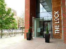 Overlooking Granary Wharf, The Lock Kitchen & Bar pairs waterside views with a menu of modern British favourites. A popular spot close to Leeds station.