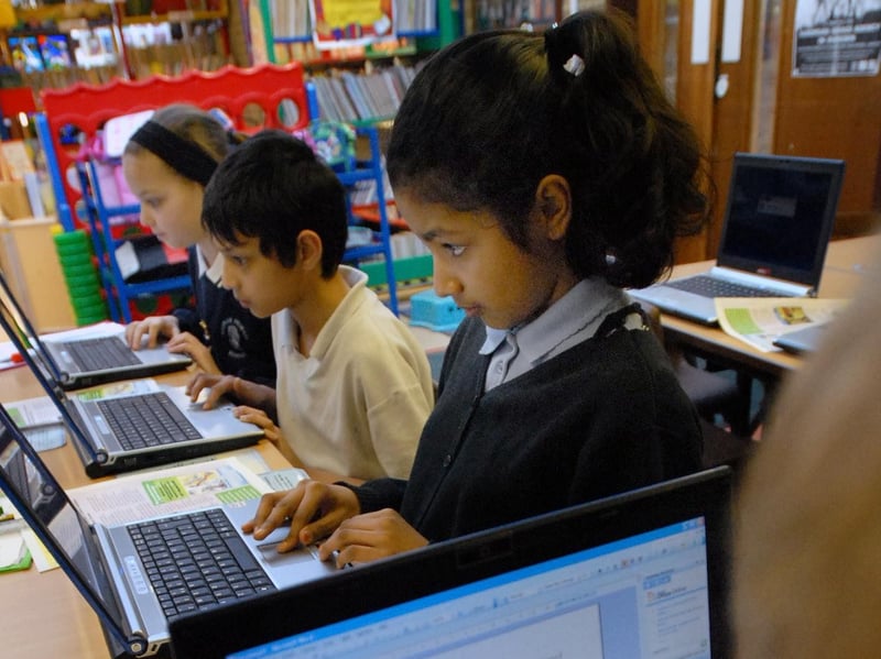 These Year 6 pupils were studying hard when we called in to see them during a laptop session 17 years ago.