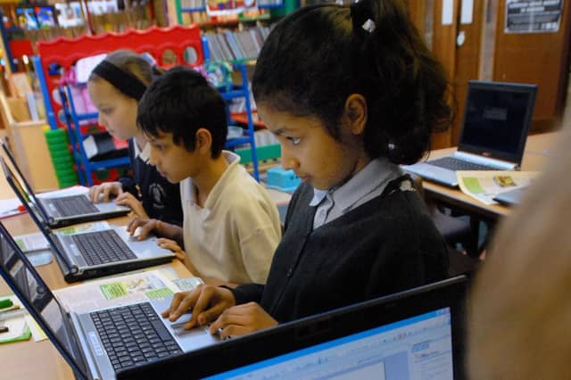 These Year 6 pupils were studying hard when we called in to see them during a laptop session 17 years ago.
