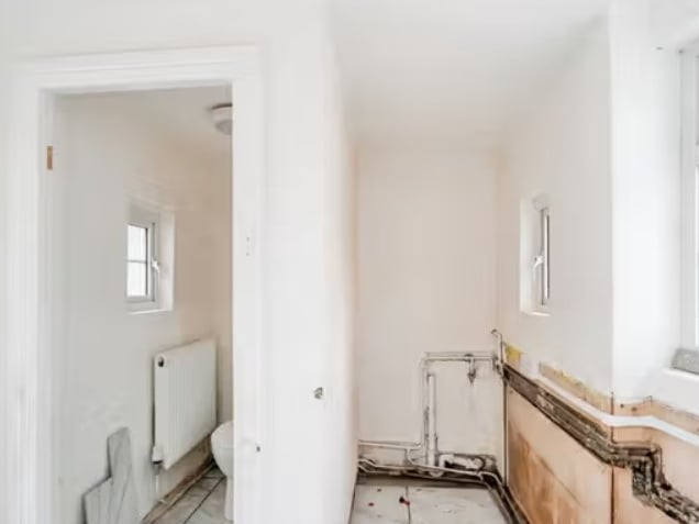 Inside this four bedroom detached home that has undergone full renovations which are near completion.