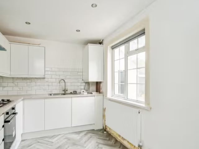 Inside this four bedroom detached home that has undergone full renovations which are near completion.