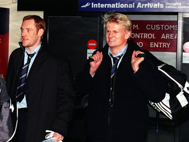   Still Smiling  David Hopkin and Alf-Inge Haaland of Leeds United arrive back at Leeds Bradford airport from Moscow last night (thurs) after their postponed game in Moscow.