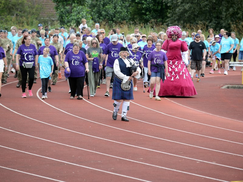 The final Relay for Life started accompanied by a lone piper.