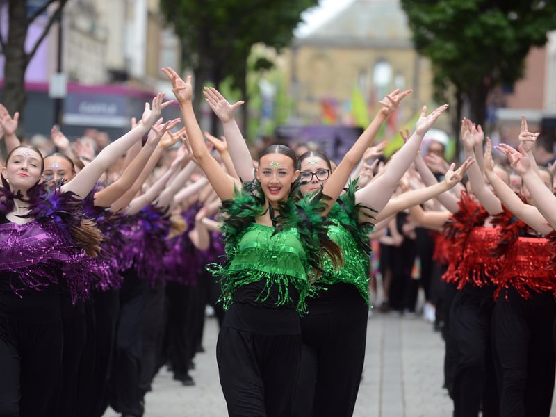 These dancers are all in sync as they perform for the crowds.