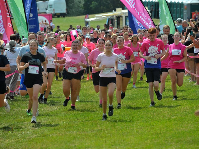 A group of runners set off at the Pretty Muddy 5k in aid of Cancer Research UK at Temple Newsam.