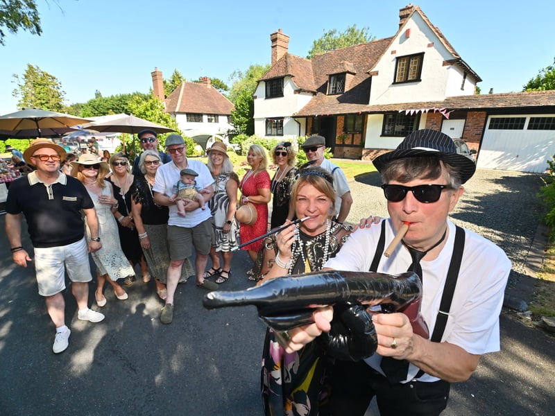 Castlecroft Gardens in Wolverhampton, a very unique street, and a special street party to mark 100 years of the street.  Fancy dress: Front: Donna Watson and Anthony Harris.