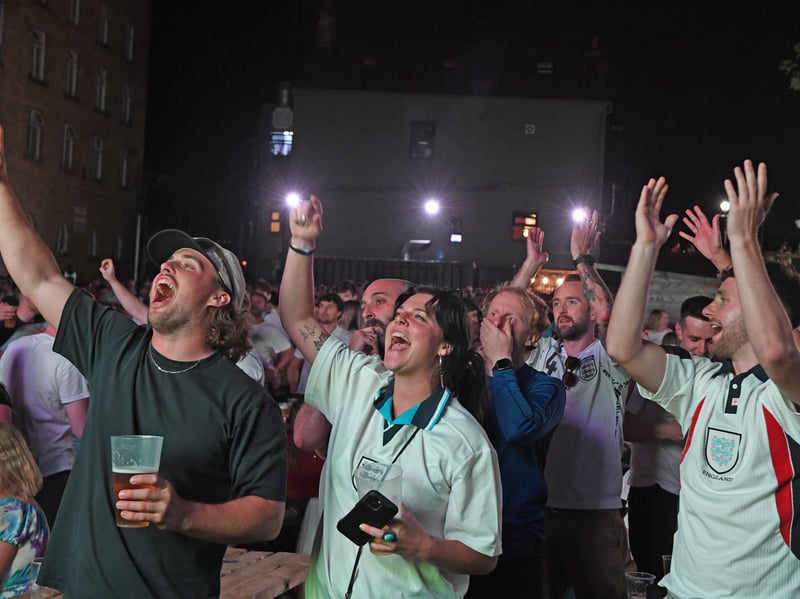 Fans celebrate England's second goal