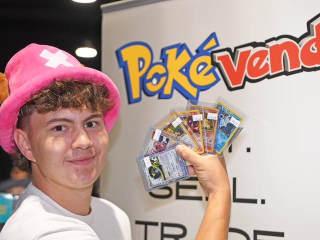 Pictured trader Archie Smithson of Pokevend with a selection of cards.