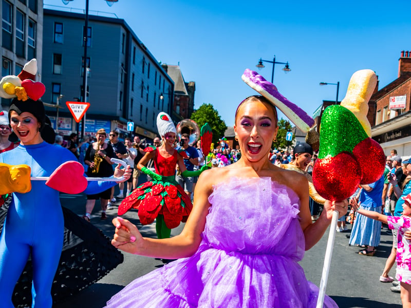 The colourful Liquorice Parade made its way from Pontefract Town Hall to Pontefract Castle with dancers, stilt walkers, community groups and the Flat Cap Brass Band entertaining visitors. 