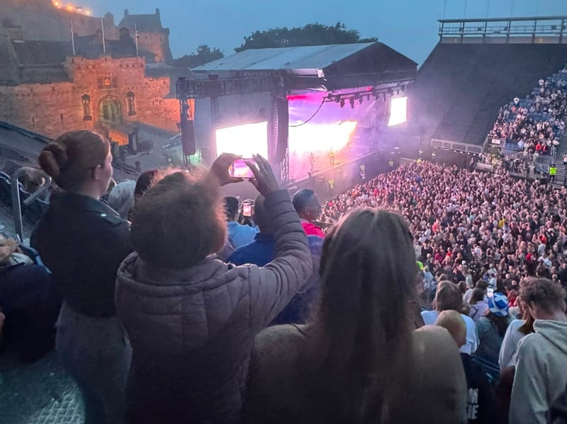 Anne Wilson shared this image of Callum lighting up the iconic venue in front of thousands of fans.