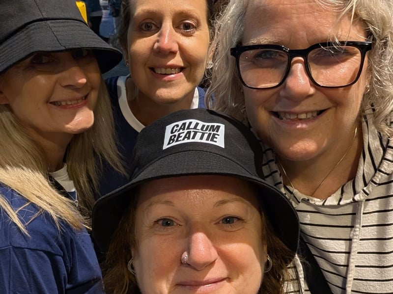Callum Beattie bucket hats were all the rage at Friday night's gig, as seen on Nicky McIntosh and her group who attended the show