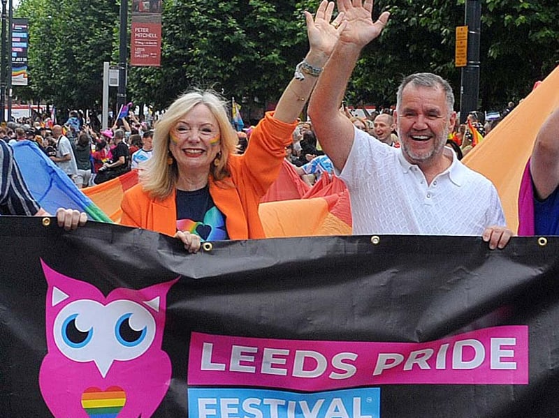 Terry George leads the parade with Tracy Brabin the Mayor of West Yorkshire.