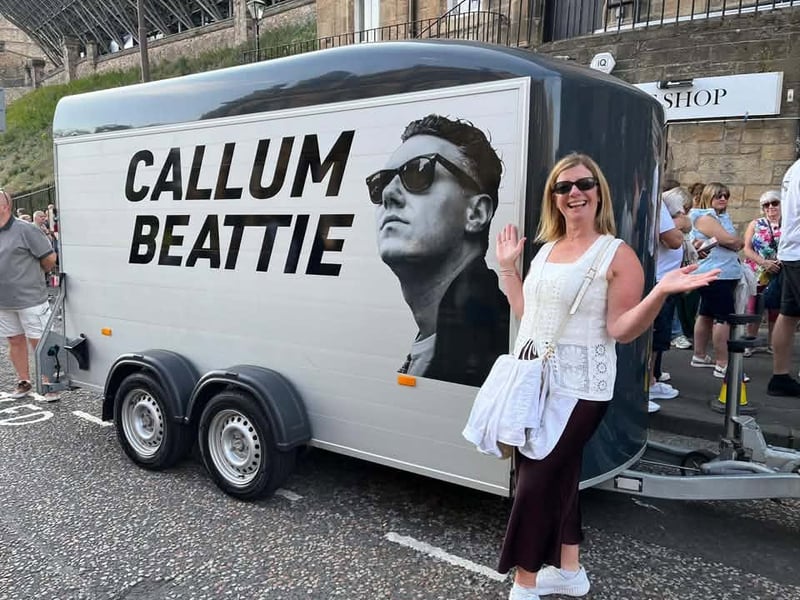 Michelle Black was one of many fans to grab a snap of the trailer outside the venue at Edinburgh Castle emblazoned with the 'Salamander Street' singer's face.