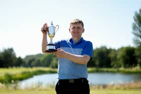 Athenry GC's David Kitt pictured with the Ulster Men’s Stroke Play Amateur Open Championship cup.