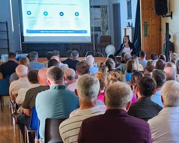 Ruth Cormican, member of the Coxtown Protection Committee, speaking at a packed public meeting in Killalaghton Hall last Sunday 