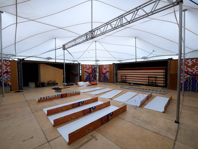 Sheets of art lie on the floor awaiting installation. Photo: Kelvin Lister-Stuttard