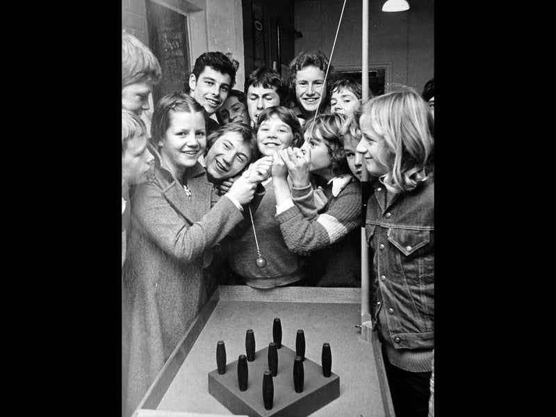 A glimpse of youth club life in Ludlow in October 1975, as 16-year-old Susan Adams gets ready to show the boys a thing or two at the table skittles. Taken at the new youth club at Galdeford, this photograph captures the social spaces where young people gathered, made friends and enjoyed evenings away from home before the days of smartphones and social media. Do you remember spending time at a youth club, playing games with friends, or the places where teenagers gathered in your town?