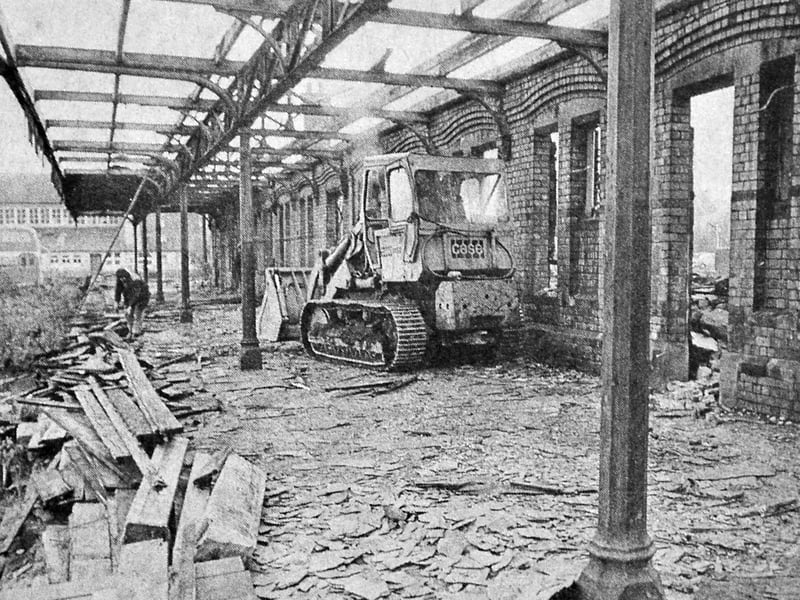 A familiar landmark disappears from the Oswestry landscape. In 1975, demolition work was underway at the Great Western railway station as the site was cleared for a new transport development. Do you have memories of catching a train here?