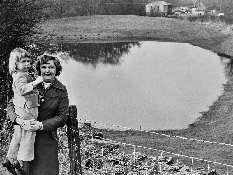Sometimes nature writes the story. This 1975 photograph shows Mrs Mary Edwards and her granddaughter, Rachael, beside an unexpected lake that appeared in the grounds of Clun Castle. Had you ever seen it before - or since?
