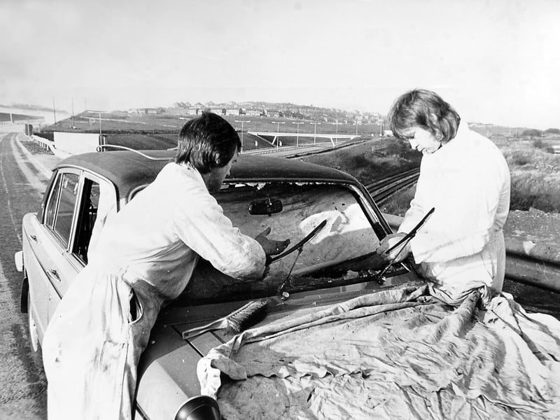 A routine repair from a very different motoring age. Ron Griffiths and John Roberts are pictured replacing a cracked windscreen in 1975, just as the M54 was about to open. Do you remember those early days of driving around Telford?
