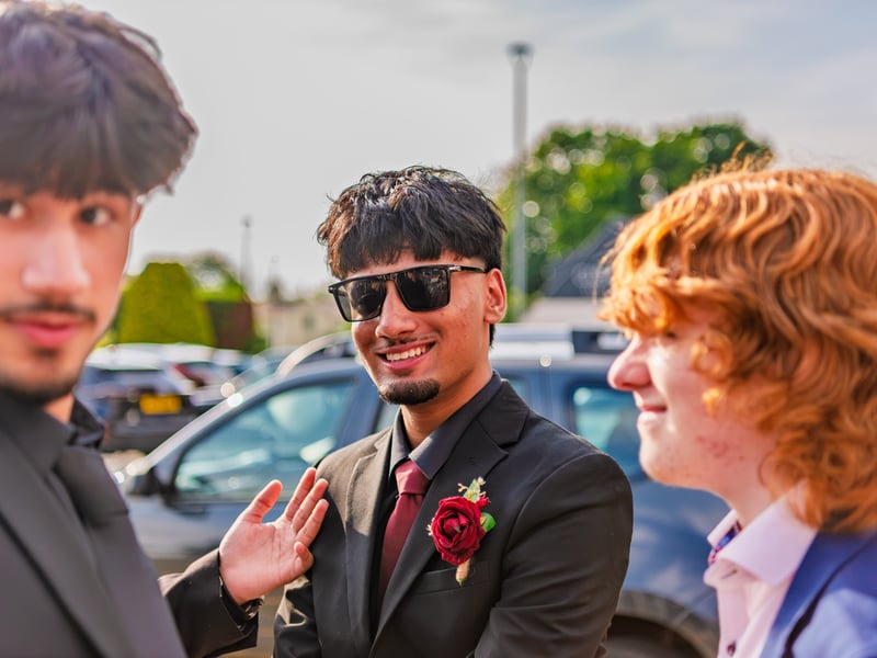  Shades on. Suit sharp. Prom mode activated.