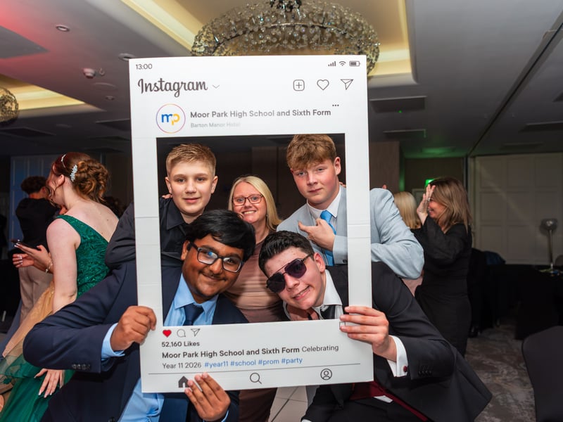 Capturing memories with the Prom selfie frame at Barton Manor.