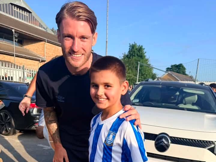 New addition Callum Slattery posed for pictures with supporters.