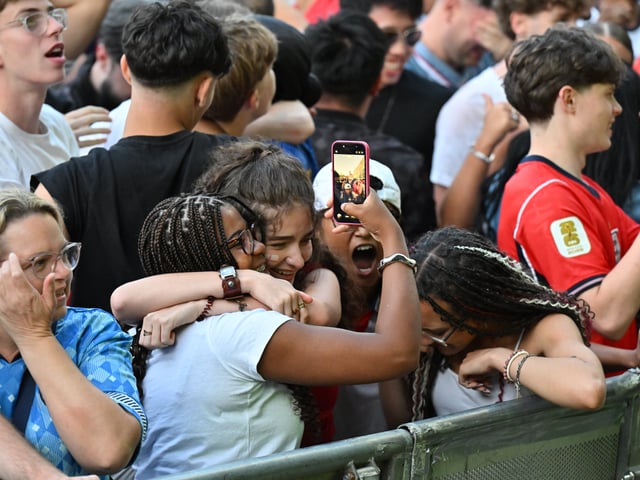 England fans in Millennium Square during the screening of England v Argentina World Cup semi final.