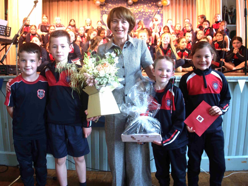 Pupils present retiring teacher Patricia Tobin with gifts