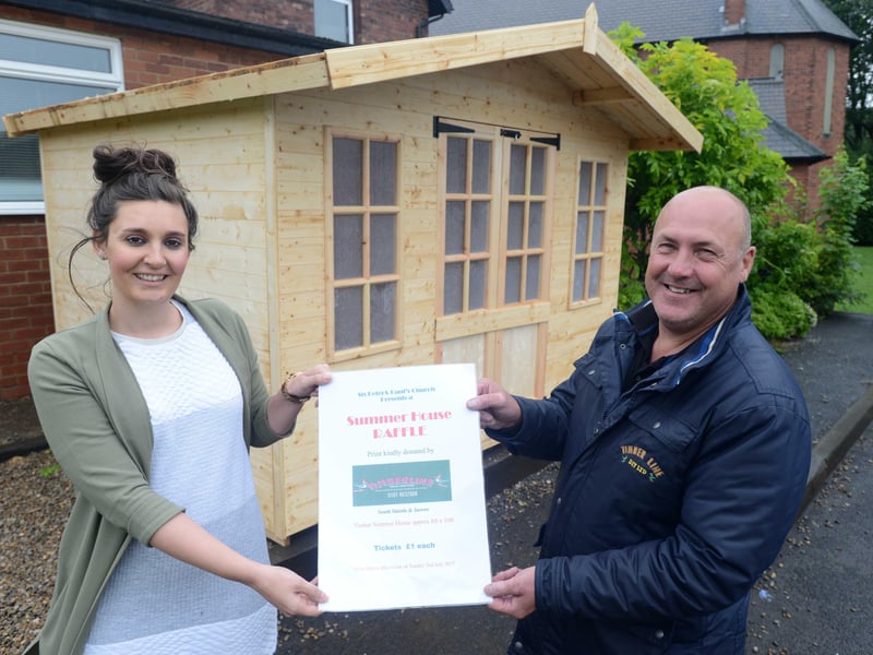 St Peters and Pauls RC Primary School held a raffle for a summer house in 2017. Teacher Kate Bucle and Timberline's Brian Moyfe were pictured.