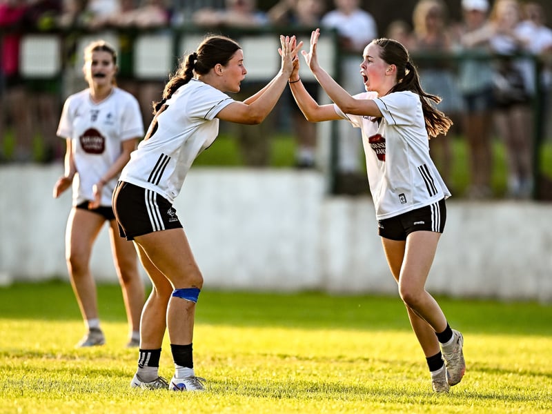 Anna Dillon of Kildare, right, celebrates with teammate Catherine Murphy after scoring their side's first goal during the 2026 AirNav Ireland All-Ireland U-16 A Championship final match between Cavan and Kildare at Páirc Chiarain in Westmeath. Photo by Seb Daly/Sportsfile