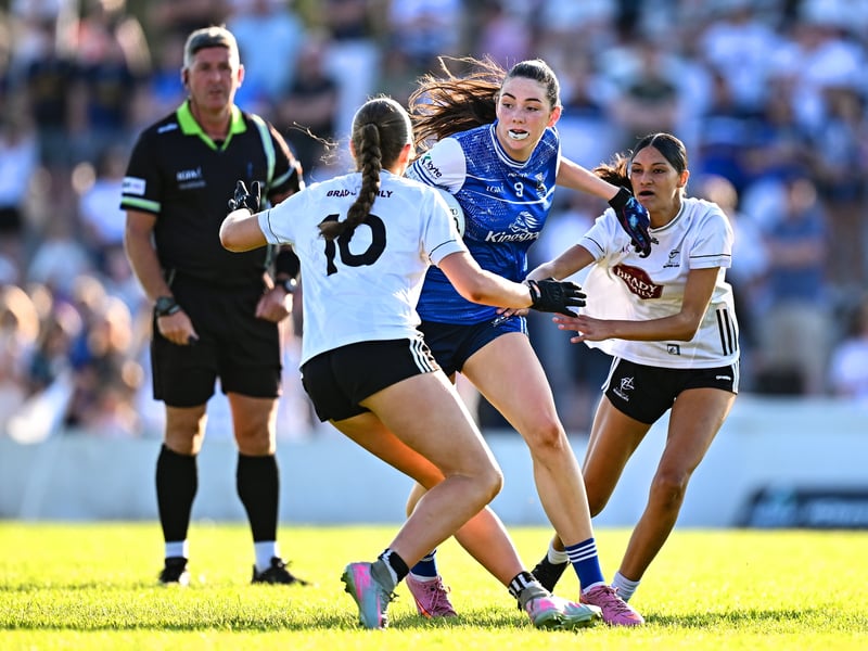 Shonagh Brennan of Cavan in action against Kildare players Grace Martin, right, and Annabelle Lundy during the 2026 AirNav Ireland All-Ireland U-16 A Championship final match between Cavan and Kildare at Páirc Chiarain in Westmeath. Photo by Seb Daly/Sportsfile