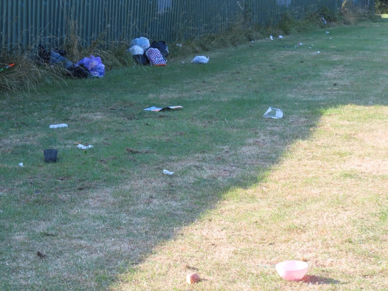 Rubbish littered on Barton Field following the traveller encampment.