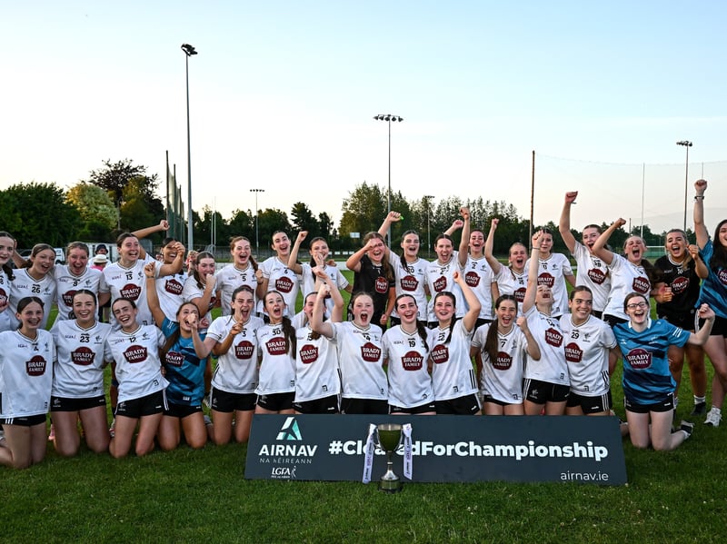 Kildare players celebrate with the trophy after their side's victory in the 2026 AirNav Ireland All-Ireland U-16 A Championship final match between Cavan and Kildare at Páirc Chiarain in Westmeath. Photo by Seb Daly/Sportsfile 