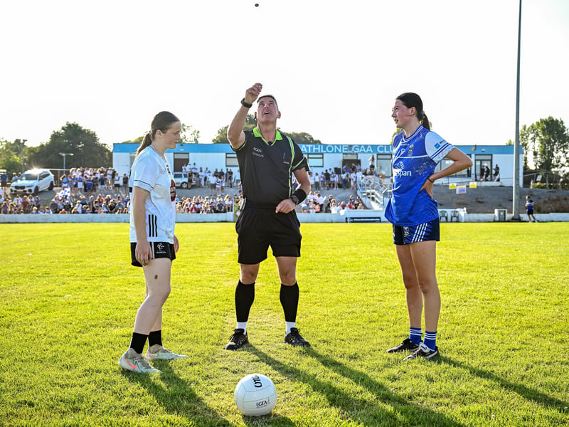 Referee Conor McCarthy with Kildare captain Amy Wall and Cavan captain Aoife Rogers before the 2026 AirNav Ireland All-Ireland U-16 A Championship final match between Cavan and Kildare at Páirc Chiarain in Westmeath. Photo by Seb Daly/Sportsfile