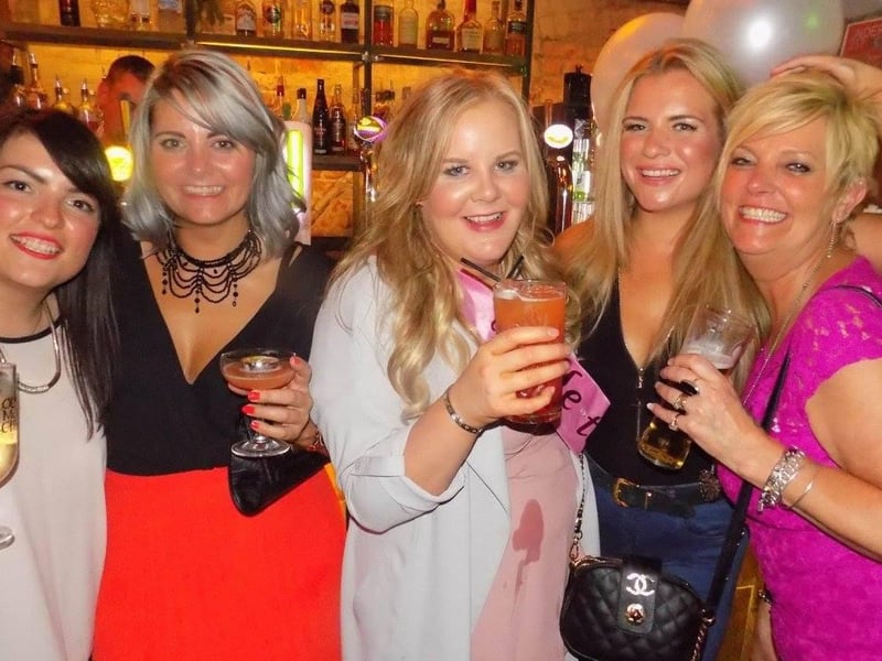 Raising a toast to all of these people who were loving their time together in Tinker Smiths.