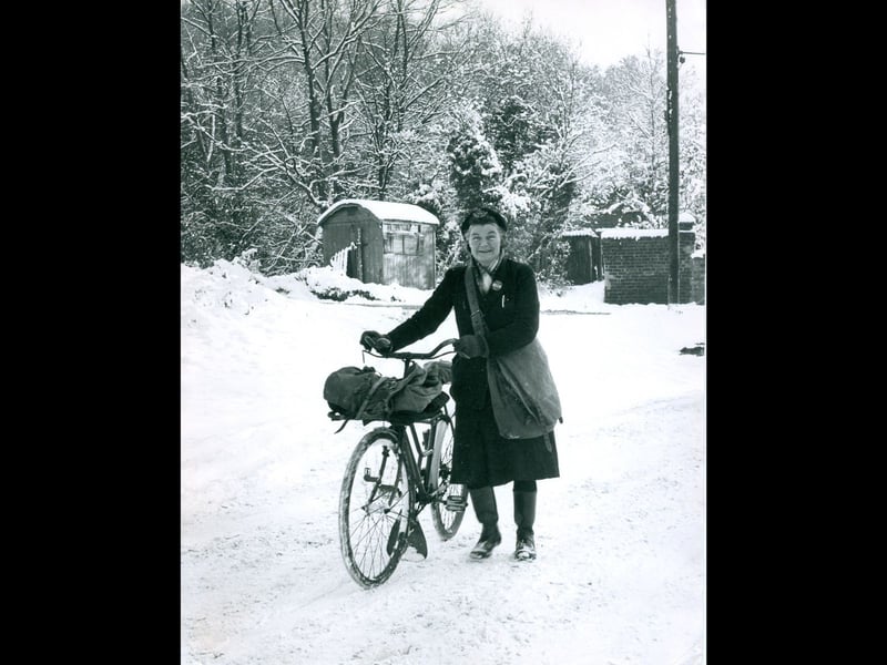 A snowy scene from Coalport in December 1967 as postwoman Mrs N Morris braves the winter weather to make sure the mail gets through. Before online messages and instant communication, the daily post was an important link between neighbours, friends and families. A lovely reminder of the dedication of those who kept communities connected, whatever the weather. Do you remember the post arriving in all seasons, or the familiar postmen and women who delivered letters to your door?