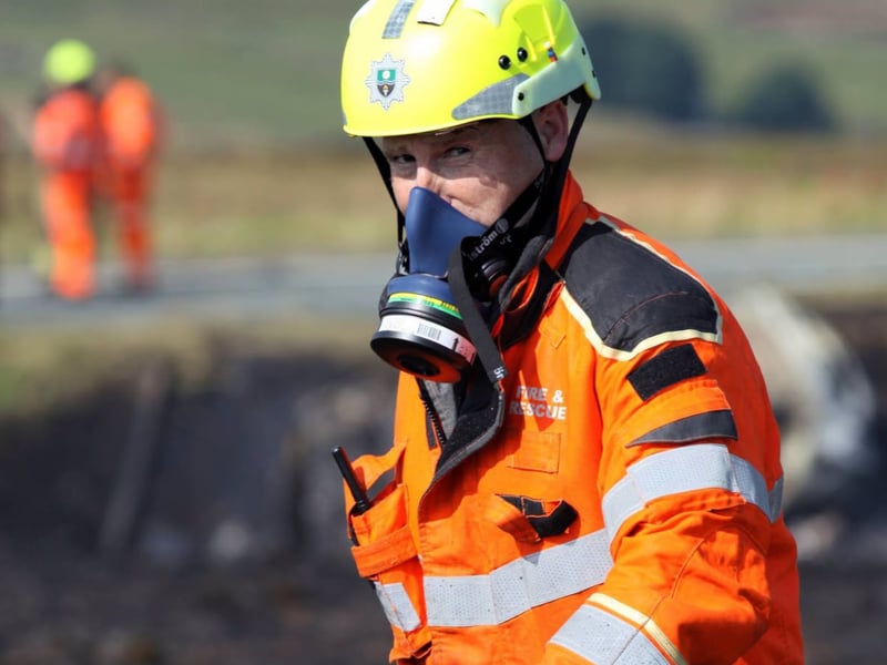 Officer in breathing gear.