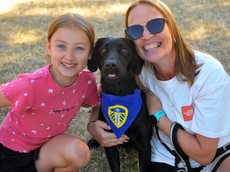 Shelley Thompson and Karis, nine, with their dog Lucas - the Leeds United fan who won waggiest tail.