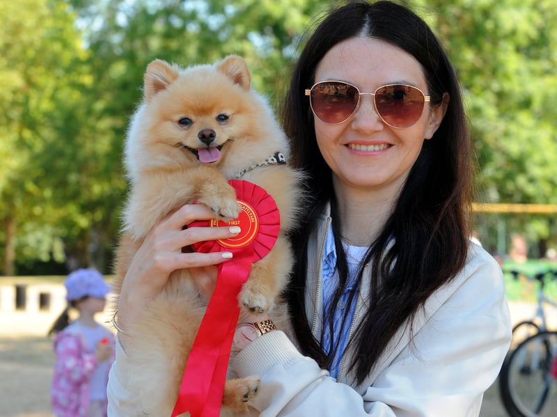 Olena Lavryk and Liah the Pomeranian which won Best Pedigree Puppy.