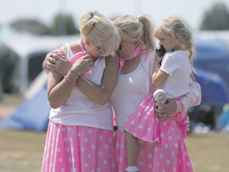 A quiet moment of support and reflection. Portsmouth Relay for Life, Portsmouth Grammar School playing fields, Hilsea. The event was in aid of Cancer Research UK
Picture: Chris Moorhouse (180726-16)