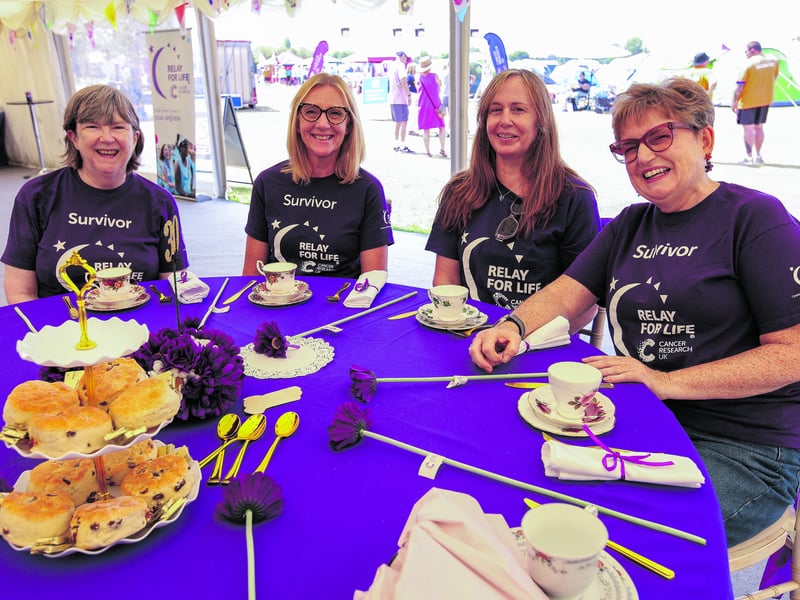 From left, Janet Sampson, Angela Newnham, Heather Smith and Maxine Kirk. Portsmouth Relay for Life, Portsmouth Grammar School playing fields, Hilsea. The event was in aid of Cancer Research UK
Picture: Chris Moorhouse (180726-30)