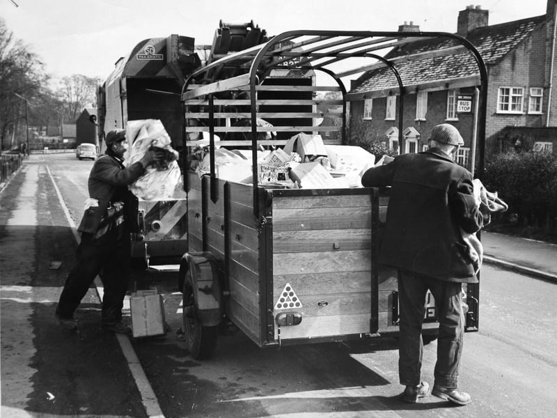 Dustman are pictured putting waste paper into a trailer which is towed by a refuse collecting vehicle. The council have purchased two trailers and householders are urged to keep waste paper apart from general household refuse. Pictured in April 1970.