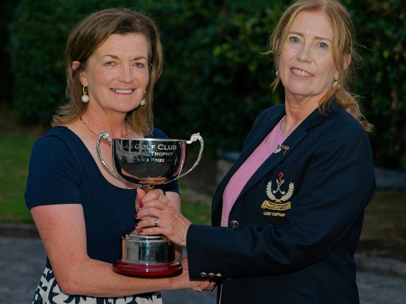 Two in a row winner of Naas Golf Club Lady Captain's Prize 2026, Anne Flanagan, receives her presentation from Lady Captain, Kate Holmes, at the prize presentations at the club, Saturday night, July 11. Anne was also last year's winner