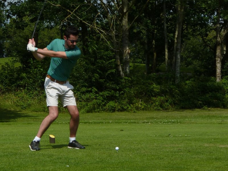 A participant takes a swing