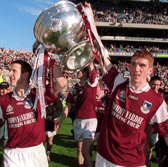 Captain Gary Fahey, left, of Galway and team-mate Kieran Fitzgerald holding Sam Maguire aloft
